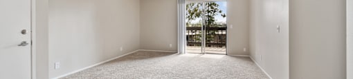 carpeted spacious living room at Terrace Gardens Apartment Homes, Escondido