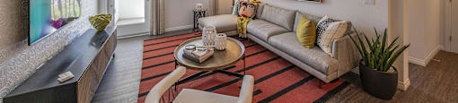 a living room with a couch and a coffee table