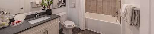 spacious bathroom with white countertops