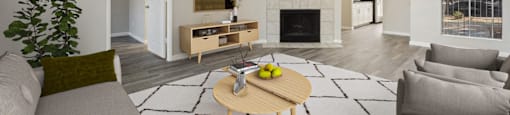 a living room with couches and a table