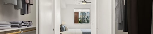 a bedroom with a large closet and a bed