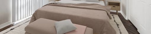 a bedroom with a large bed and a ceiling fan