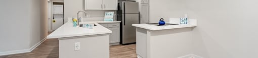 kitchen with island at Pointe Luxe Apartment Homes, San Diego, CA, 92110
