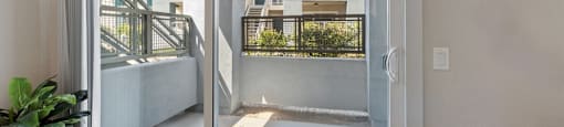 large glass balcony door at Pointe Luxe Apartment Homes, San Diego, CA, 92110