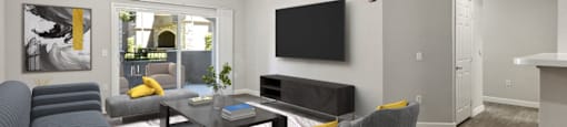 a living room with couches and a table and a television