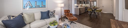 a living room with a couch and a table