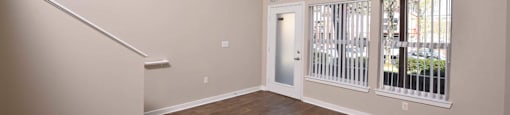 Living Room With Expansive Window at Russellville Commons, Oregon