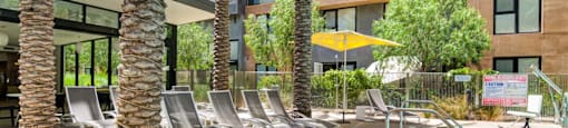 Poolside Sundeck With Relaxing Chairs at Block C, San Marcos, CA