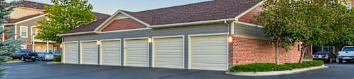 a car garage in front of a house