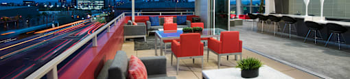 a lounge area on the top of a building