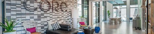 community lounge area and leasing office at Core Apartments