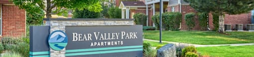 the entrance to bear valley park apartments