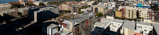 a view of the city from the roof of a building