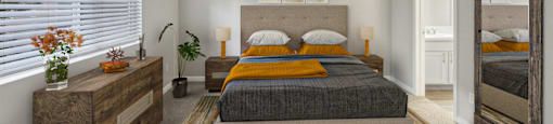 a bedroom with a bed and a mirror