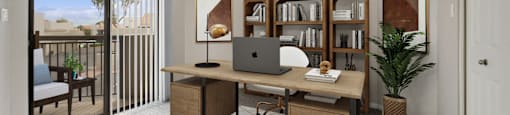 a home office with a laptop on a desk and a door to a balcony