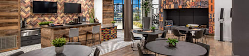 a restaurant with tables and chairs and a bar and a television