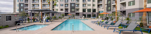 our apartments have a large swimming pool with lounge chairs