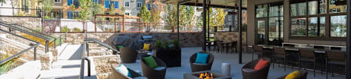 Outdoor Living Area Including Bbq'S And Fire Pits at Tivalli Apartments, Lynnwood, WA, 98087