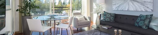 Living Room With Private Balcony at Tivalli Apartments, Washington