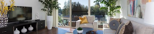 Marvelous Looking Living Room With TV at Tivalli Apartments, Lynnwood, Washington