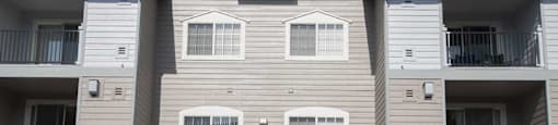 Fresh exterior with in-unit parking at Marina Village Apartments, Sparks NV