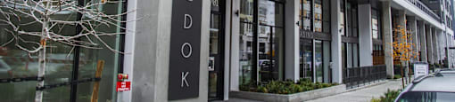 the facade of a building with a large sign that reads wardork