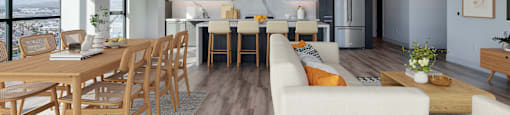a living and dining room area with a table and chairs