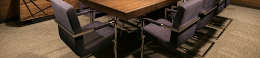 coworking room with a wooden table and chairs