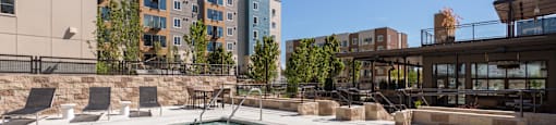 Pool With Sunning Deck at Tivalli Apartments, Washington