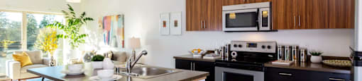 Gourmet Kitchen With Island at Tivalli Apartments, Lynnwood, Washington