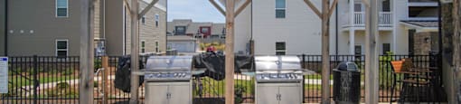 The outdoor grilling station, pictured here, is a favorite amenity of many residents of Peachtree Village.