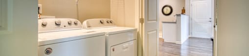A close-up view of the in-unit laundry available to residents.