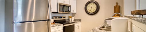 A detailed look at Peachtree Village’s Granite countertops and stainless- steel appliances
