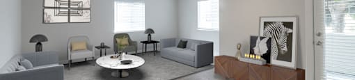 a living room with gray walls and a white ceiling fan at Nobel Court, San Diego, California