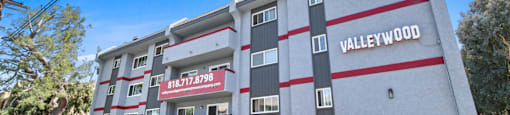 A building with the name VALLEYWOOD on it.