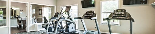 Fitness Center with cardio equipment at Chelsea Village Apartments