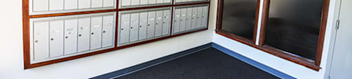 Mailroom in the elderly building at Carriage House Evansville, with mailboxes.