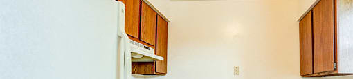 Williamsburg on the Lake Valparaiso Townhome Kitchen is Fully Equipped with Refrigerator, Stove, Dishwasher, Sink, and Cabinets