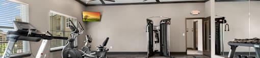 the gym with treadmills and other exercise equipment at the enclave at woodbury