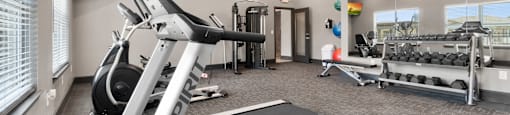 gym with exercise equipment and windows at the preserve at greatstone