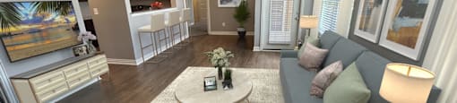 a living room with a couch and a table