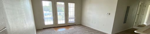 living room with plush carpeting and ceiling fan