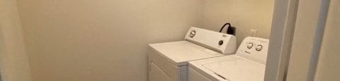 In-home washing machine and dryer with shelving above
