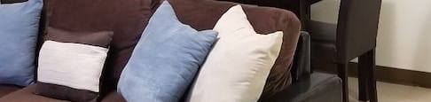 comfortable couch and chairs and tables