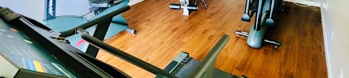 fitness center with cardio and strength equipment
