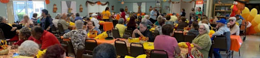Residents enjoying Thanksgiving in the community dining room
