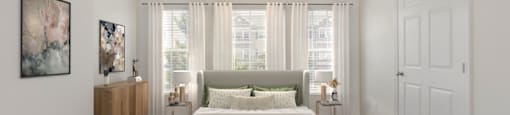 a bedroom with a bed and a large window at Stone Gate Apartments in NC at Stone Gate Apartments, Spring Lake, NC