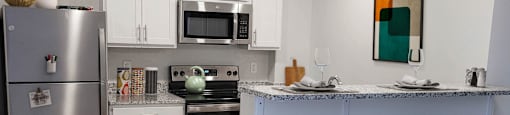 a kitchen and dining area in sandy spring village