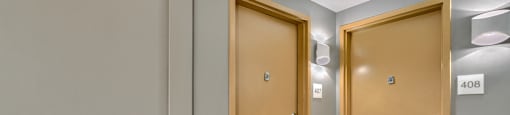 Two doors with numbers 408 on them.