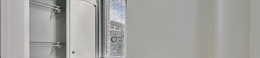 A room with a door and a window.